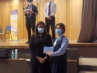 Yazmin Tamrakar receiving the Best Interrogative Debater award